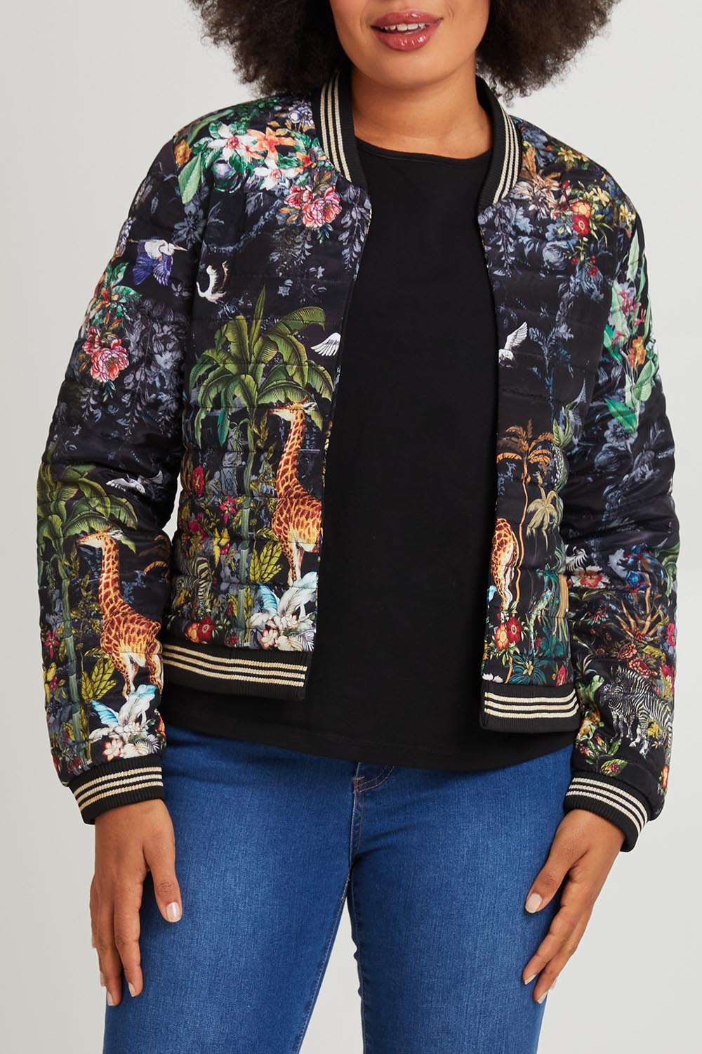 Model Olivia wearing size S of the Jungle Jacket in colour Black (Black), from the front, cropped image