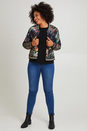Model Olivia wearing size S of the Jungle Jacket in colour Black (Black), from the front, showing the whole outfit