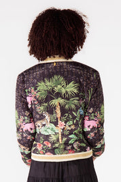A model wearing the Nouveau Quilted Jacket in colour Black (Black), from the back