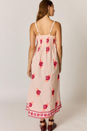 Model Genericm wearing size sample of the Palmy Sundress – Pink in colour Pink, from the front