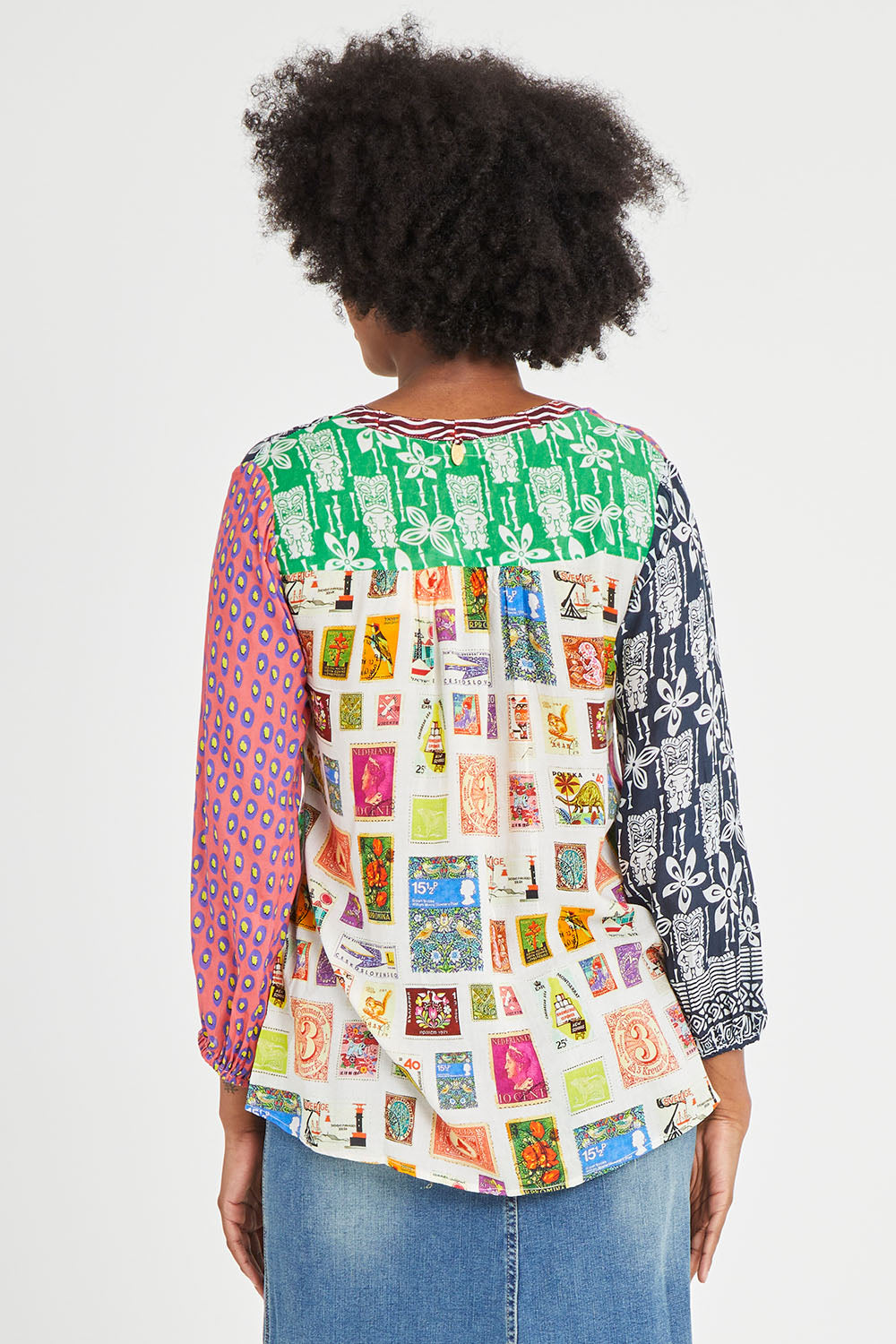 Model Aiyana wearing size S of the Destination Patch Shirt in colour Multi (Green), from the back