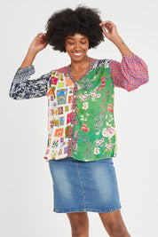 Model Aiyana wearing size S of the Destination Patch Shirt in colour Multi (Green), from the front, cropped image