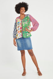 Model Aiyana wearing size S of the Destination Patch Shirt in colour Multi (Green), from the front, showing the whole outfit