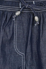 Product shot of the Pula Short – Denim in colour Denim, showing detail