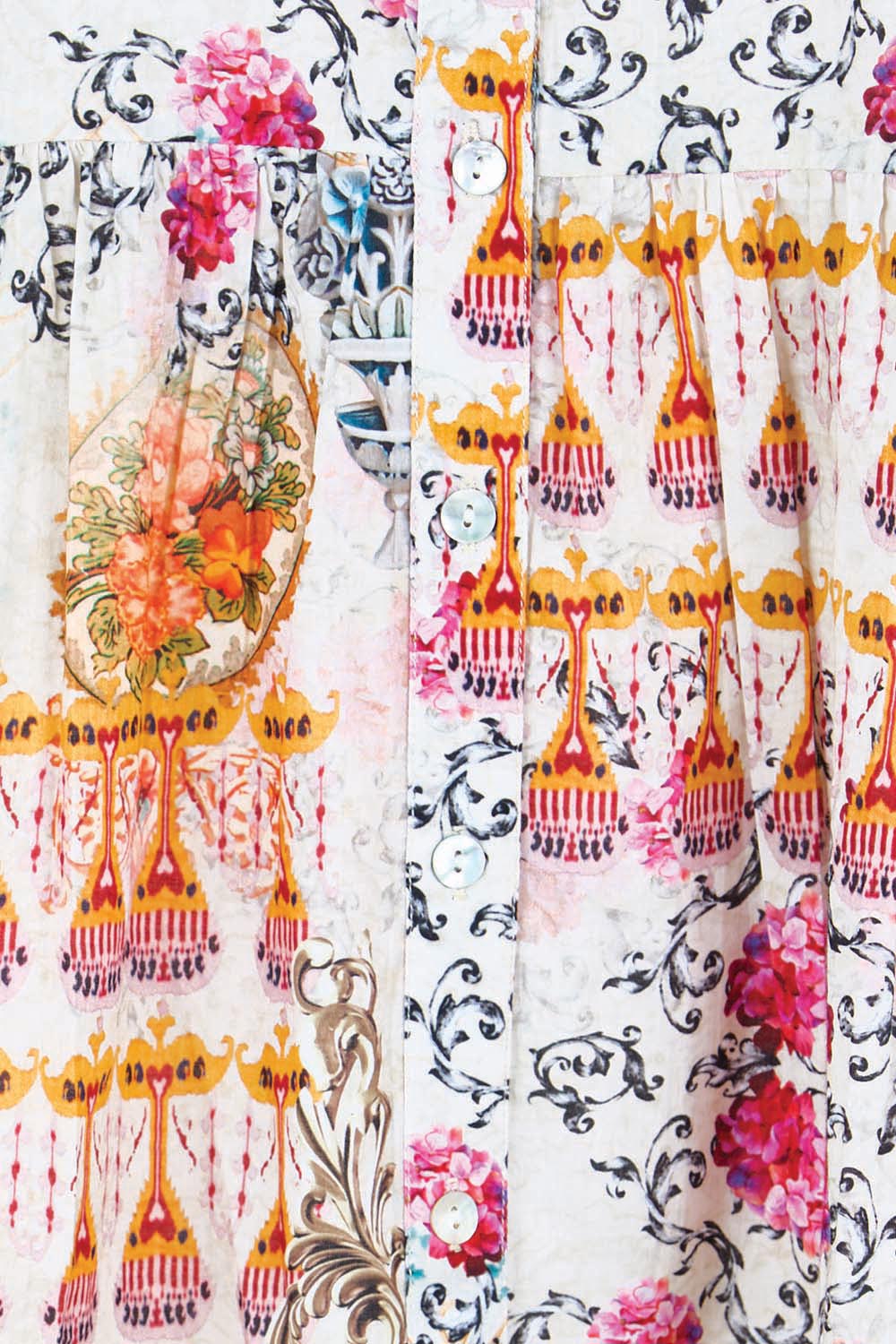 Product shot of the Rosetta Dress – Gold in colour Gold, showing detail