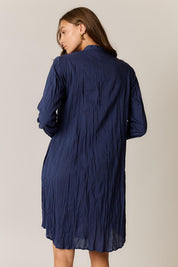 Model Genericm wearing size sample of the Sasha Shirtmaker Dress – Navy in colour Navy, from the back