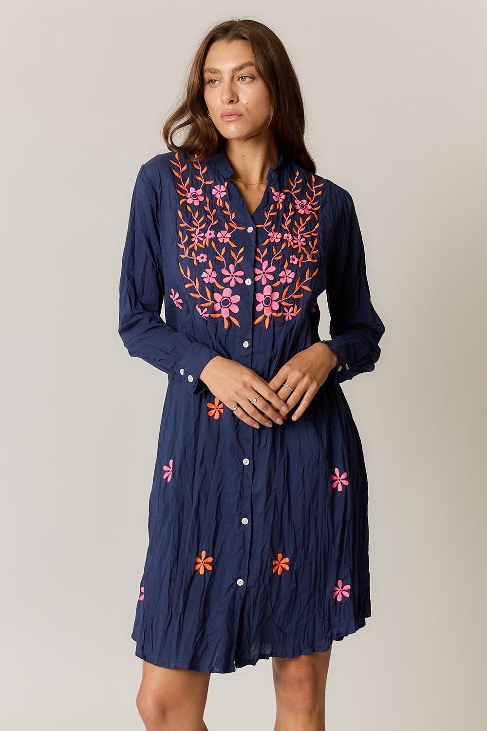 Model Genericm wearing size sample of the Sasha Shirtmaker Dress – Navy in colour Navy, in a cropped view