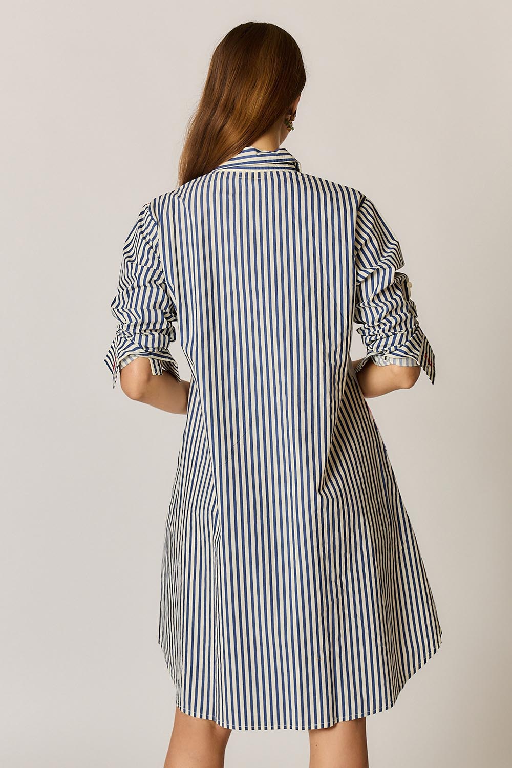 Model Genericm wearing size sample of the Sicily Dress – Print in colour Print, from the back