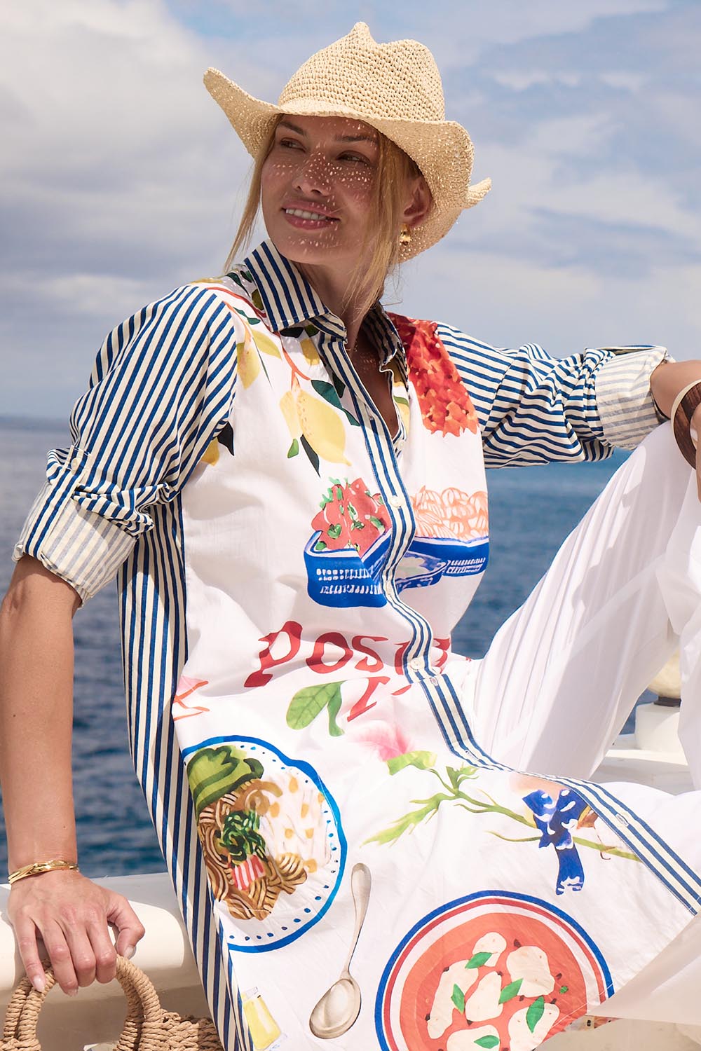 Model Genericm wearing size sample of the Sicily Cotton Dress – Print in colour Print, in a cropped view