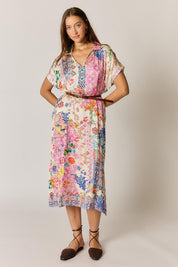 Model Genericm wearing size sample of the Songbird Kaftan Dress – White in colour White, from the front