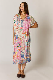 Model Genericm wearing size sample of the Songbird Kaftan Dress – White in colour White, from the front