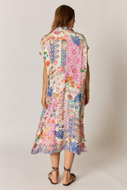 Model Genericm wearing size sample of the Songbird Kaftan Dress – White in colour White, from the front