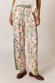 Model Genericm wearing size sample of the Tatiana Pant – Pink in colour Pink, in a cropped view