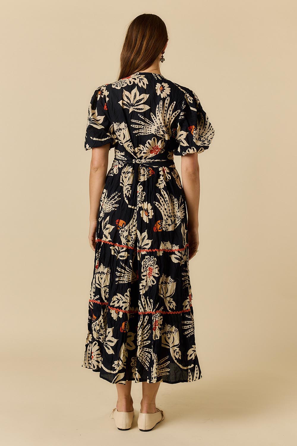 Model Genericm wearing size sample of the Tucan Maxi Dress – Black in colour Black, from the front