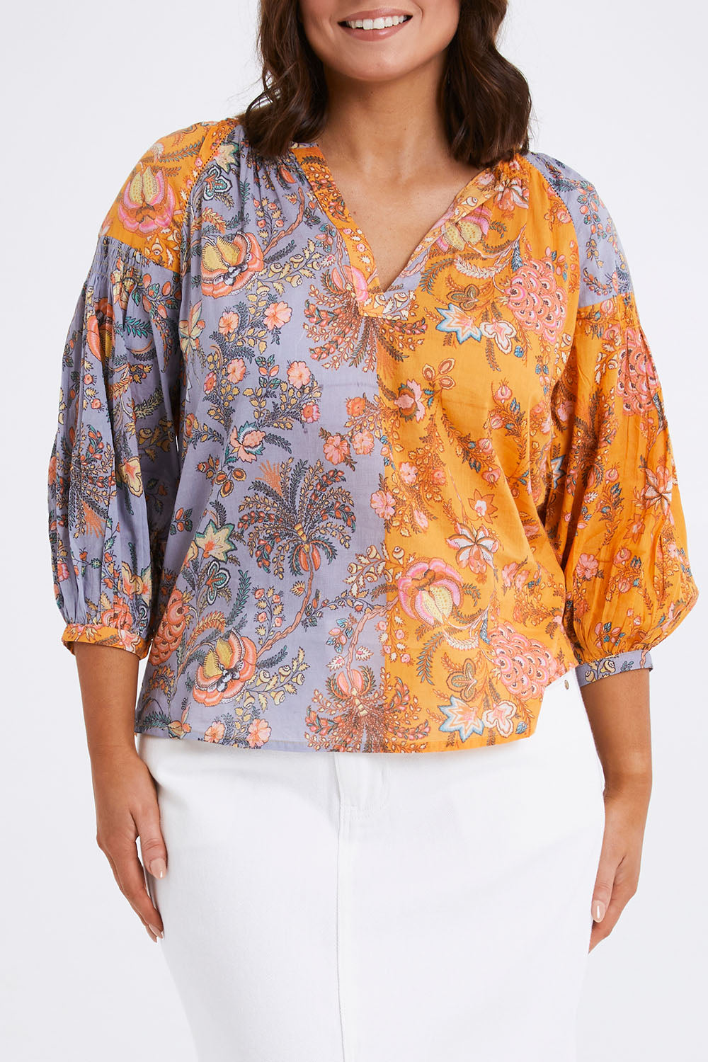 Model Monique wearing size L of the Willow Shirt in colour Multi, from the front, cropped image