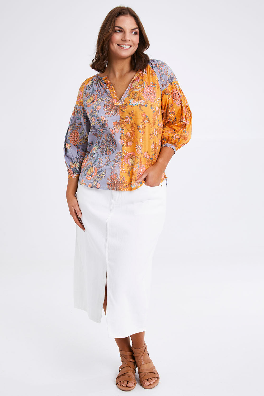 Model Monique wearing size L of the Willow Shirt in colour Multi, from the front, showing the whole outfit