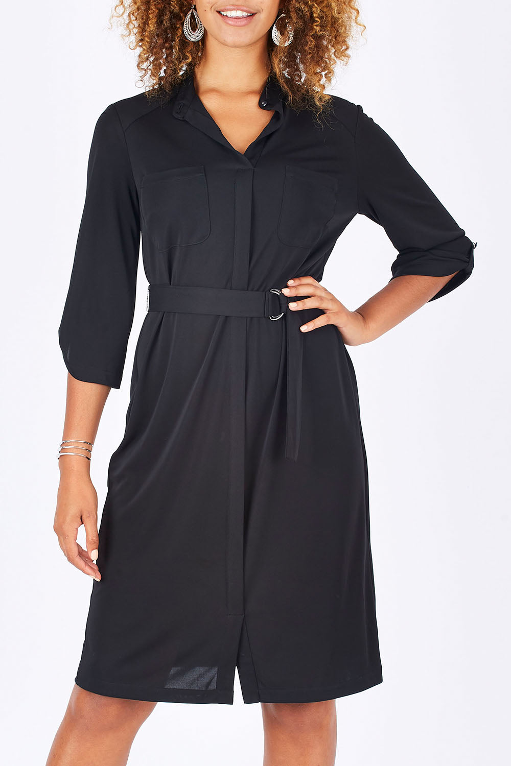 Model Summer wearing size 10 of the Fluid Jersey Shirtmaker in colour Black (Black), from the front, cropped image
