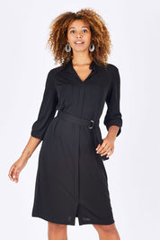Model Summer wearing size 10 of the Fluid Jersey Shirtmaker in colour Black (Black), from the front, cropped image