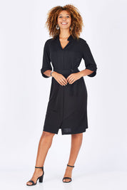 Model Summer wearing size 10 of the Fluid Jersey Shirtmaker in colour Black (Black), from the front, showing the whole outfit