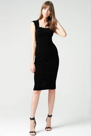 A model wearing the Iris Cap Sleeve Dress in colour Black (Black), from the front, showing the whole outfit