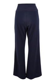 Product shot of the Classic Trouser in colour Navy (Blue), from the back