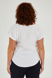 Model Maddy wearing size 16 of the Analia Top in colour White (White), from the back