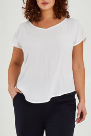 Model Maddy wearing size 16 of the Analia Top in colour White (White), from the front, cropped image