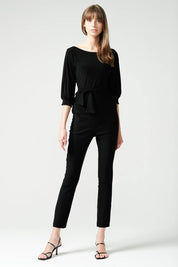 A model wearing the Cowl Tie Top in colour Black (Black), from the front, showing the whole outfit