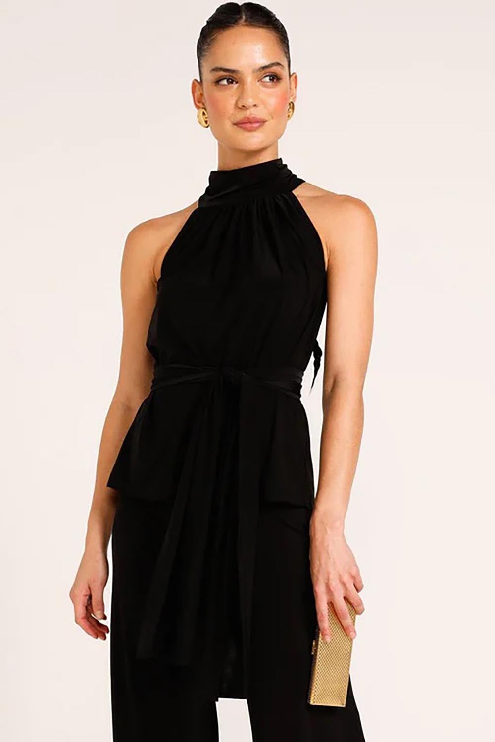 A model wearing the High Neck Tie Top in colour Black (Black), from the front, cropped image