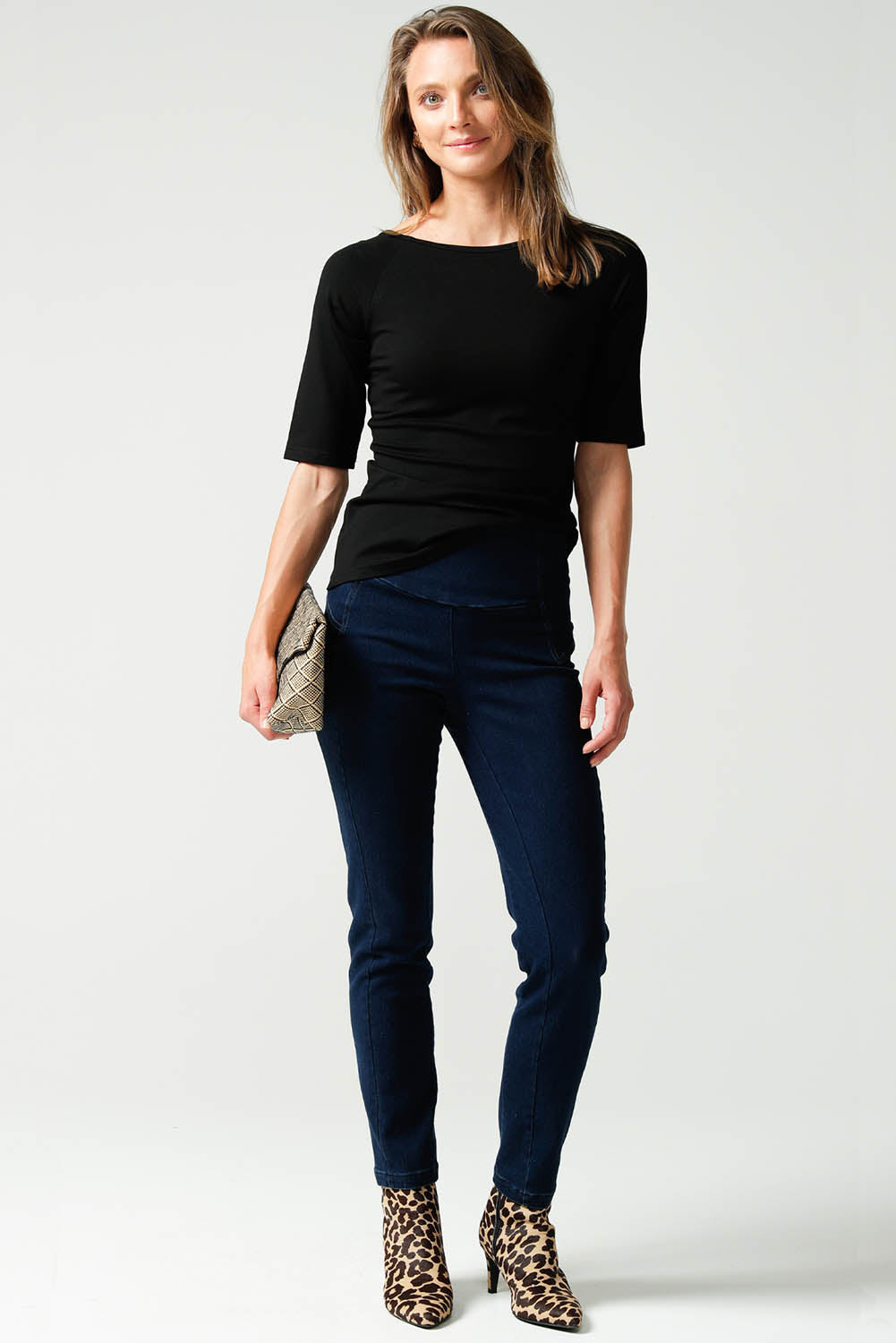 A model wearing the 3/4 Sleeve Top in colour Black (Black), from the front, showing the whole outfit