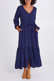 Model Olivia wearing size 10 of the Brigitte Balloon Sleeve Maxi Dress in colour Navy (Blue), from the front, cropped image