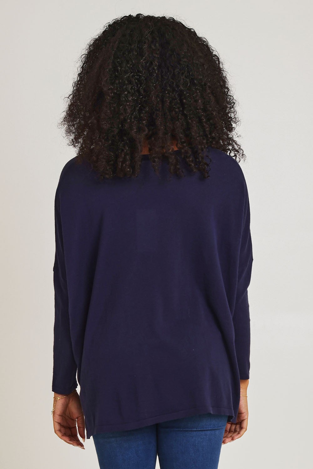 Model Ziara wearing size 10 of the Khaleesi Cotton Knit Top in colour Navy (Blue), from the back