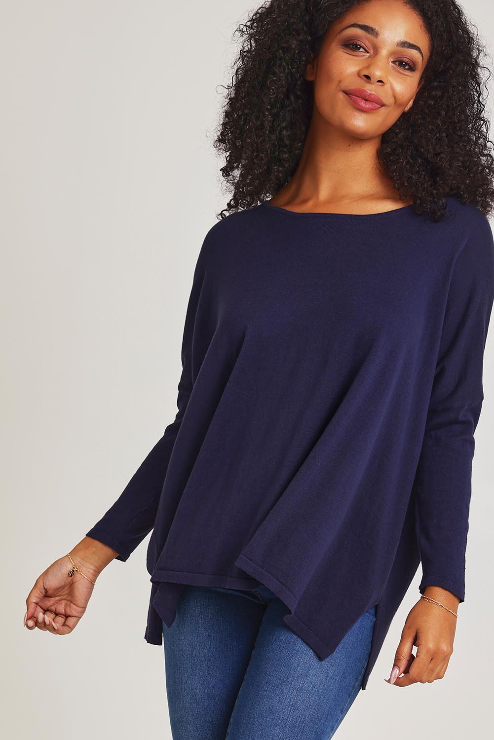 Model Ziara wearing size 10 of the Khaleesi Cotton Knit Top in colour Navy (Blue), from the front, cropped image