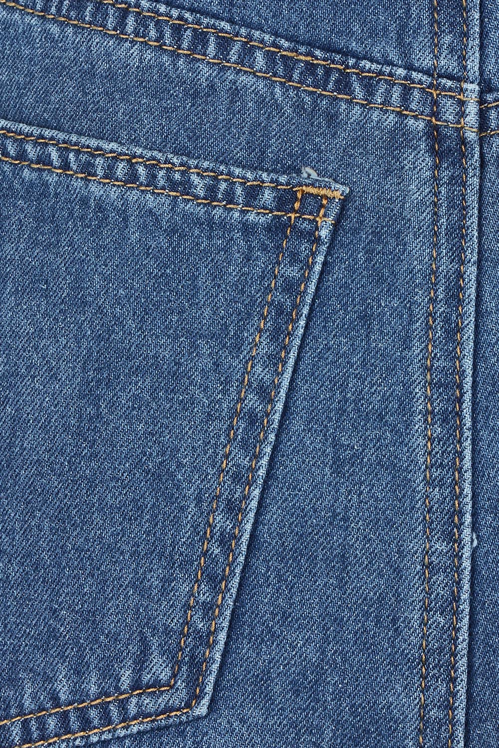 Product shot of the Vale Scalloped Denim Skirt in colour Midblue (Blue), detail