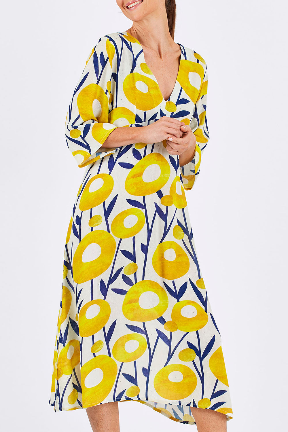 Model Monique wearing size 10 of the Manstrale Midi Dress in colour Poppy, from the front, cropped image
