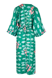 Product shot of the Middag Dress in colour Grejuniper (Green), from the back