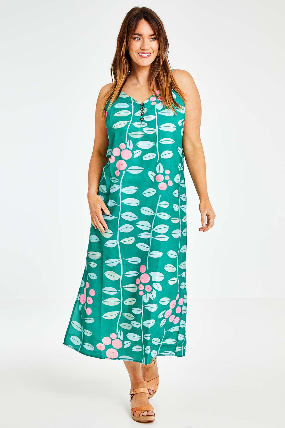 Model Laura wearing size 14 of the Flytande Maxi Dress in colour Grejuniper (Green), from the front, showing the whole outfit