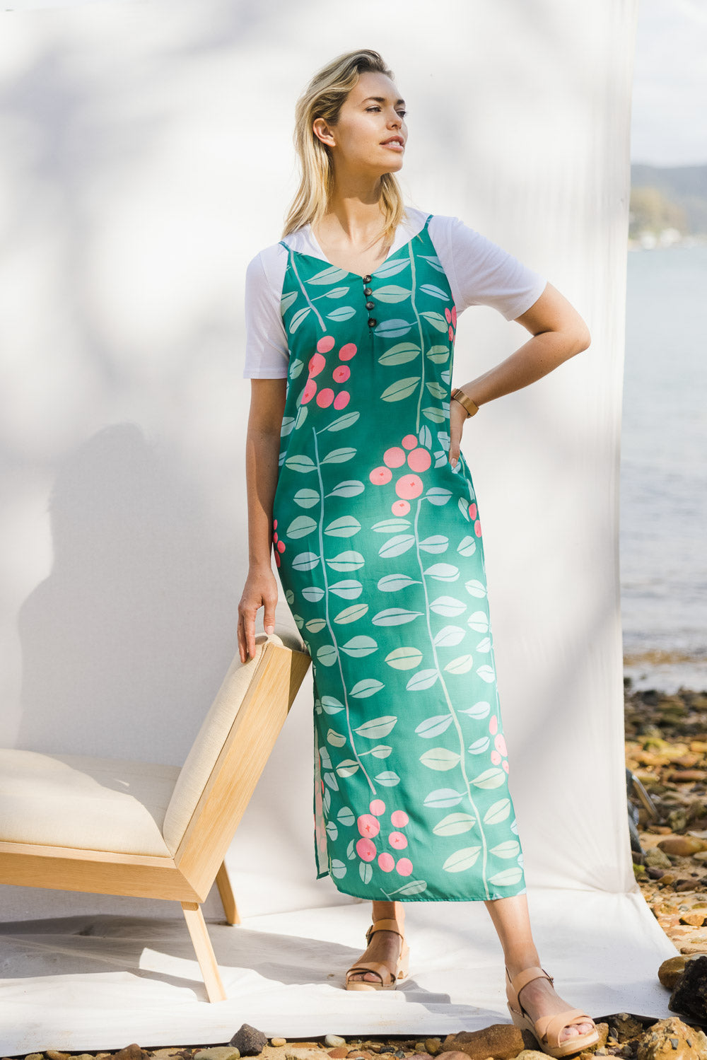 Model Phoebe wearing size 10 of the Flytande Maxi Dress in colour Grejuniper (Green), from the front, showing the whole outfit