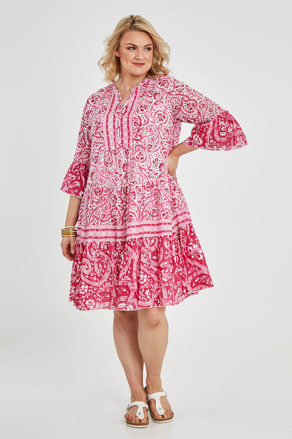 Model Keeara wearing size 16 of the Alexandria Bay Cotton Dress in colour Pink (Pink), from the front, showing the whole outfit