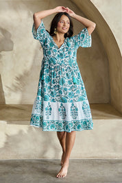 Model Tahneei wearing size 10 of the Cocora Valley Cotton Dress – Greenaqua in colour Greenaqua, from the front