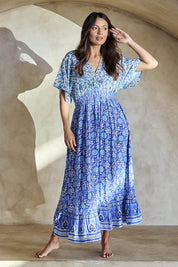 Model Tahneei wearing size 10 of the Pacific Beach Long Dress – Blue in colour Blue, from the front