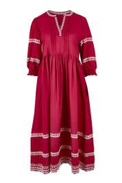 Product shot of the Magdelena River Cotton Dress in colour Rosebud (Pink), from the front