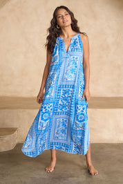 Model Tahnee wearing size 10 of the Sapphire Beach Long Dress in colour Bluewhite (Blue), from the front, showing the whole outfit