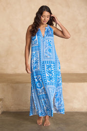 Model Tahnee wearing size 10 of the Sapphire Beach Long Dress in colour Bluewhite (Blue), from the front, showing the whole outfit