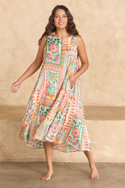 Model Tahnee wearing size 10 of the Sapphire Beach Midi Dress in colour Multi, from the front, showing the whole outfit