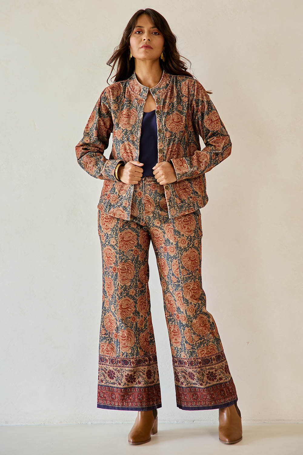 Model Tahnee wearing size 10 of the Adelong Falls Corduroy Pant in colour Ornate, from the front, showing the whole outfit