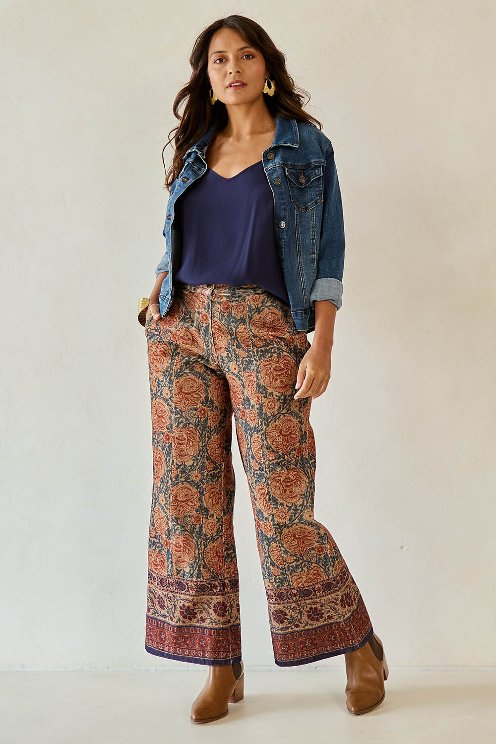 Model Tahnee wearing size 10 of the Adelong Falls Corduroy Pant in colour Ornate, from the front, showing the whole outfit