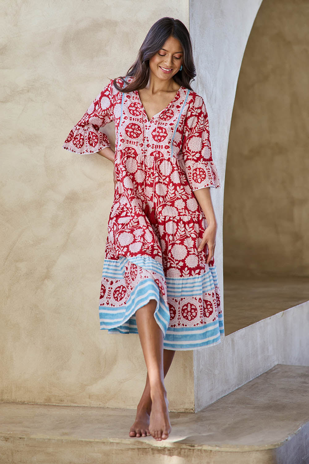 Model Tahneei wearing size 10 of the Hyams Beach Cotton Dress – Redblue in colour Redblue, from the front
