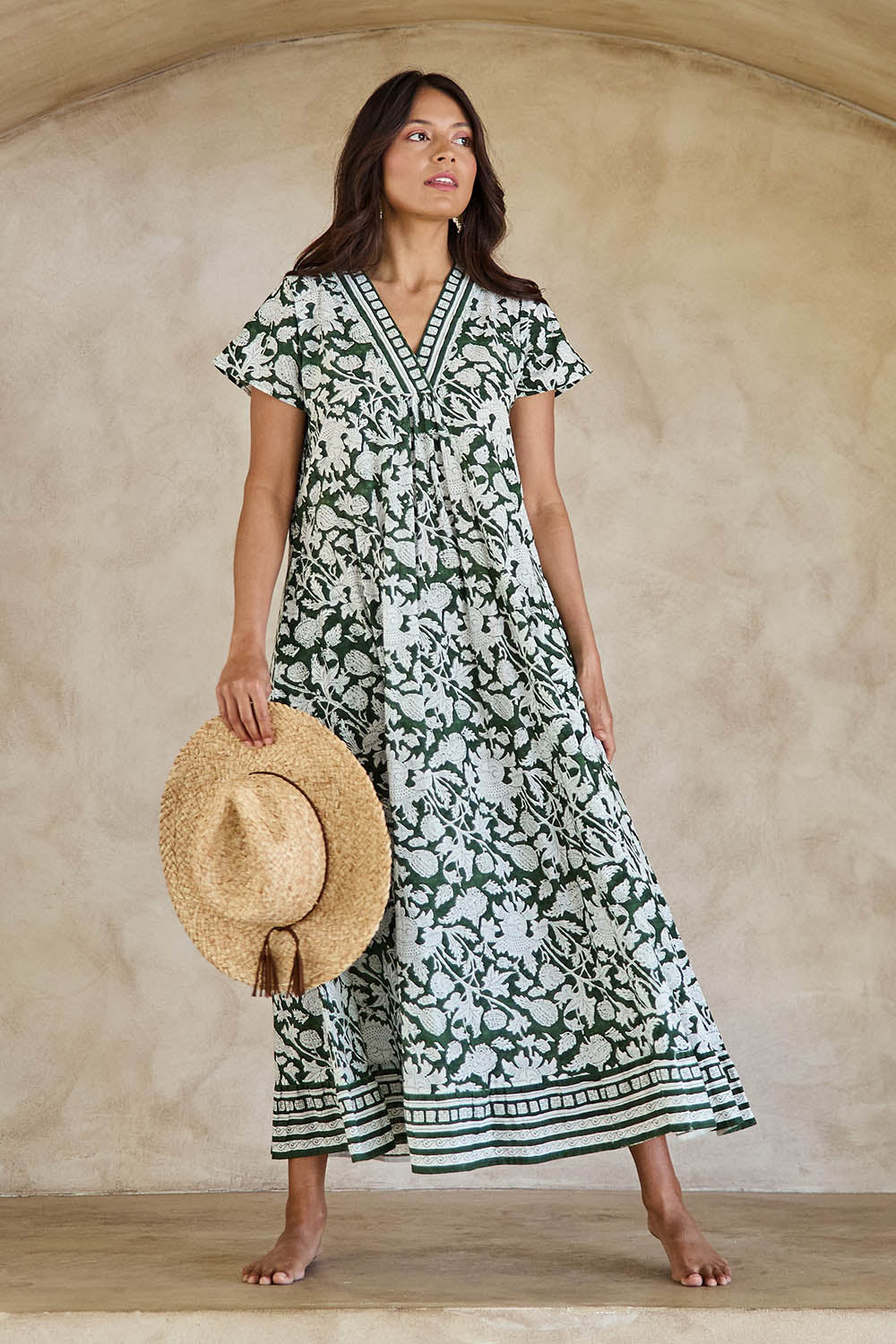 Model Tahneei wearing size 10 of the Kurrawa Beach Cotton Dress – Green in colour Green, from the front