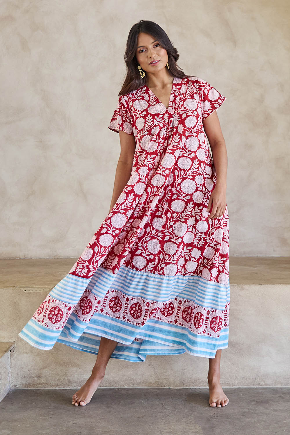 Model Tahneei wearing size 10 of the Kurrawa Beach Cotton Dress – Redblue in colour Redblue, from the front